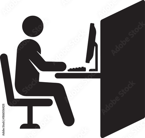 Silhouette of a man working on a laptop in office