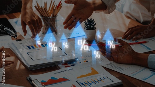 Εκτύπωση καμβά A diverse business team engages in data analysis, examining growth charts and digital percentage icons during a brainstorming session in an office setting