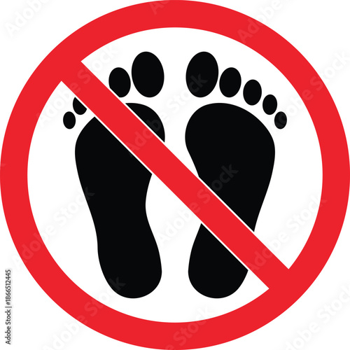 Red circle with diagonal line over black footprints no walking symbol prohibition sign forbidden