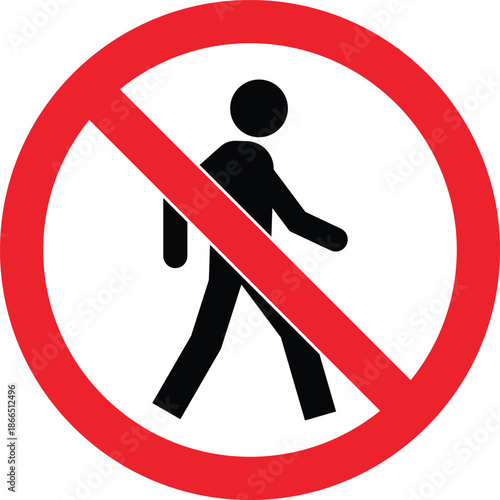 Red circle with diagonal line over black pedestrian symbol no walking allowed no walking sign pedestrian prohibition