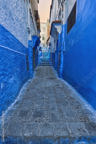 Narrow, stepped, pedestrian passageway linking the different levels of the medina, painted as is customary in shades of blue. Chefchaouen-Morocco-027