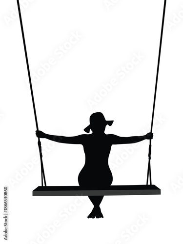 Silhouette of a woman on a swing