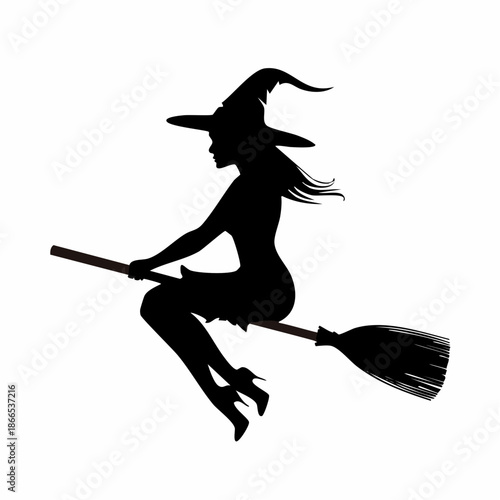 Mysterious witch silhouette riding broomstick in the night of Halloween celebration spooky season