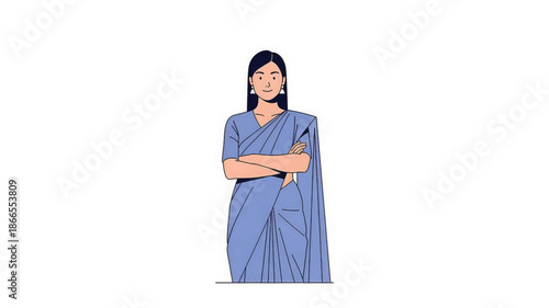 A confident woman in a blue sari with her arms crossed standing