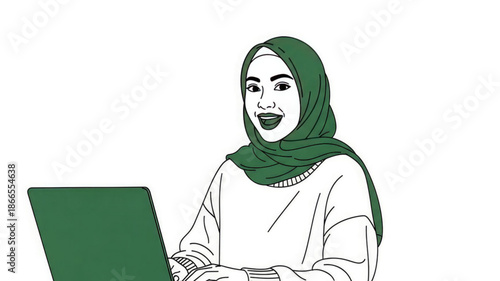 A smiling woman wearing a green hijab working on a laptop computer
