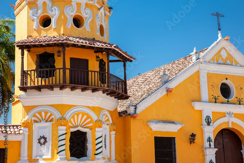 Wallpaper Mural Bell tower and balcony of the beautiful historic Church of Santa Barbara built in 1613 at the beautiful colonial Heritage Town of Santa Cruz de Mompox in Colombia. Torontodigital.ca