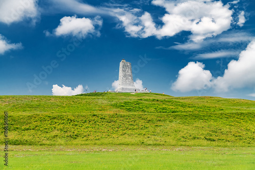 Fotografie Historic Wright Brothers Memorial rising above green hill in North Carolina