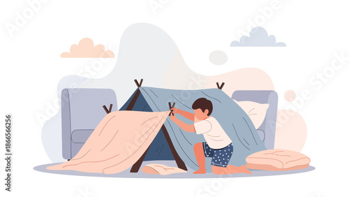 Boy Building Tent Indoors In Living Room Enjoying Creative Playtime