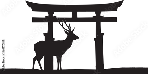 Japanese torii gate with a deer in front striking black silhouette