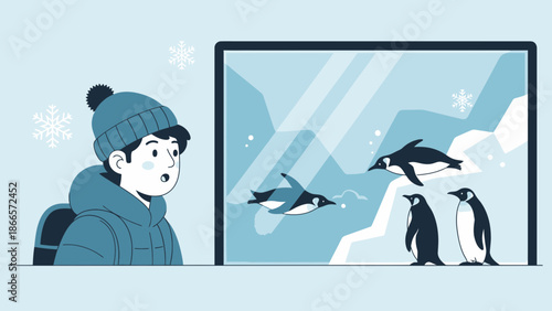 Awe Struck Boy Watching Penguins Swimming And Playing In Their Enclosure
