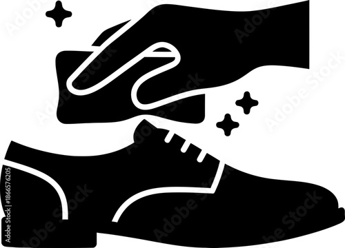 Hand polishing a classic mens shoe with a cloth and sparkling effect. Cleaning luxury footwear. Solid filled black icon for textile, web design