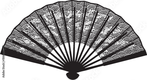 Intricate black fan with detailed wave and dragon design silhouette