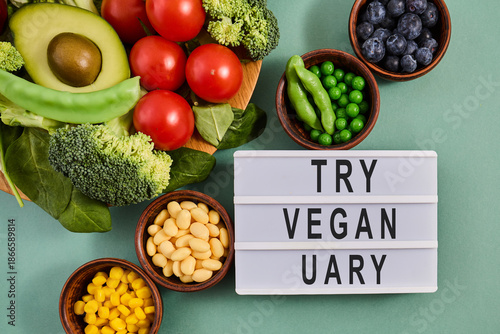 Try veganuary message with fresh plant-based food ingredients