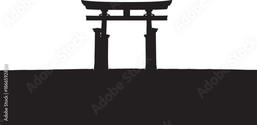 Japanese torii gate against a dark landscape a striking silhouette