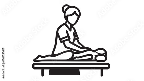 Therapist Performing Massage on a Client Lying on a Massage Table