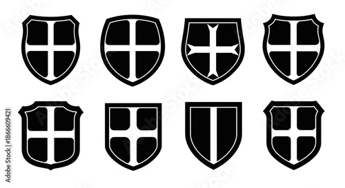 Set of nine medieval shield icons with cross symbols