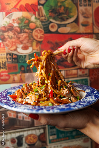 Explore a mix of dishes from different cuisines featuring noodles and vegetables in a vibrant setting