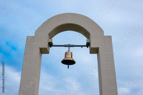 Hanging brass bell for religious purposes