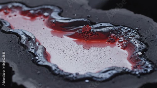 Molten Gold Pouring Into Rough Dark Mold Intense Heat Glowing Orange Liquid Flowing Hot Metal Industrial Process