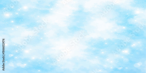 An abstract blue bokeh background blends with a bright summer sky where fluffy white clouds and sunlight create a beautiful clear atmosphere of heavenly nature