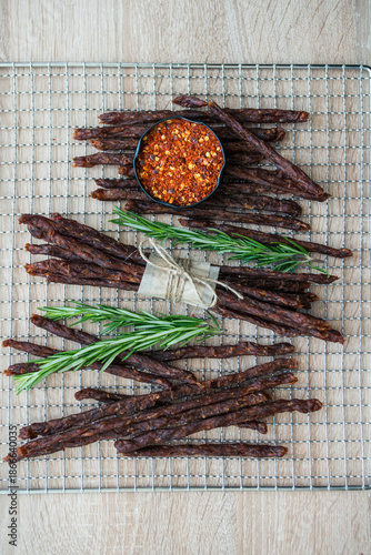 Cabano sausages laid out on a dehydrator mesh