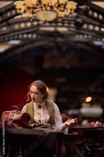 beautiful woman scientist in retro style with smoking pipe