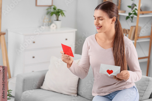 Young woman reading love le...