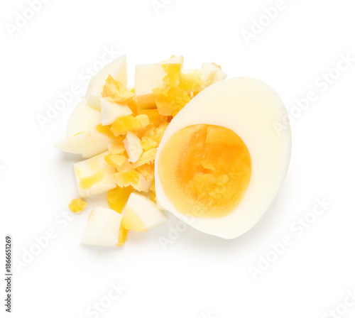 Cut boiled eggs on white ba...