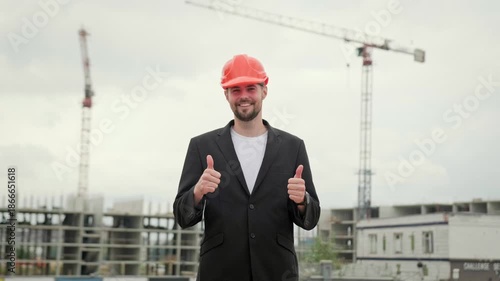 Portrait of young foreman working at construction site