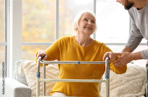 Senior woman with walker an...