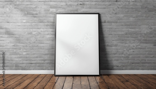 mockup of a blank vertical frame leaning slightly backward against a gray brick wall, placed on a wooden floor