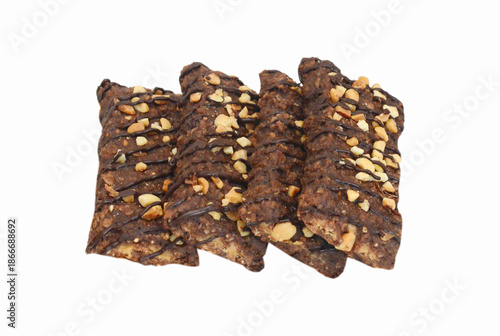 Honey bars with peanuts on white background