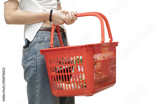 Wallpaper Mural Woman Holding Red Shopping Basket Isolated on White Background for Grocery and Retail Concept Torontodigital.ca