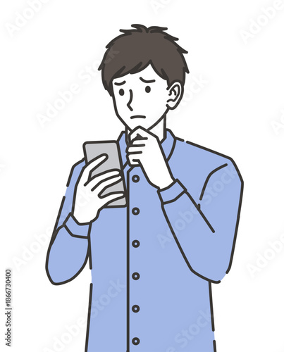 スマホを見ながら悩む20代男性