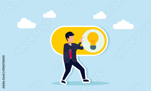 Businessman pushing a light switch illustrating creative and innovative thinking
