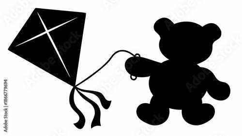 Black silhouette teddy bear flying kite outdoors playfully