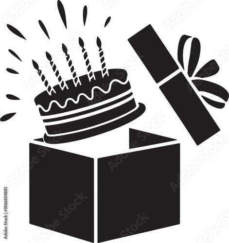 Surprise birthday cake in open gift box with candles and confetti for party celebration events