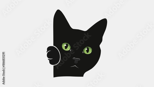 Black cat peeking around corner with green eyes.