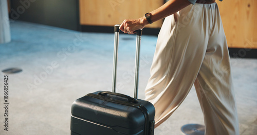 Tableau sur toile Woman, legs and walking in airport with suitcase for international trip, travel adventure and vacation