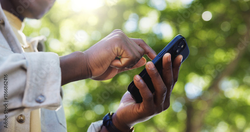 Photography Man, hands and outdoor with phone for networking, travel planning and website search at bokeh