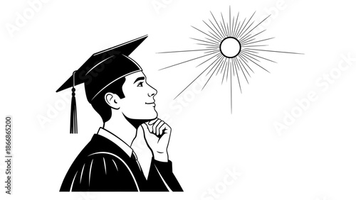 A young man in a graduation cap and gown looks up at a bright sun, lost in thought on a happy graduation day.