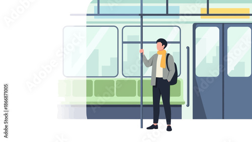 Man standing on a train platform holding a pole with a train in the background