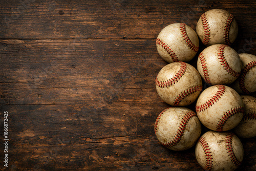 Vintage Baseballs on Rustic Wooden Table with Copy Space