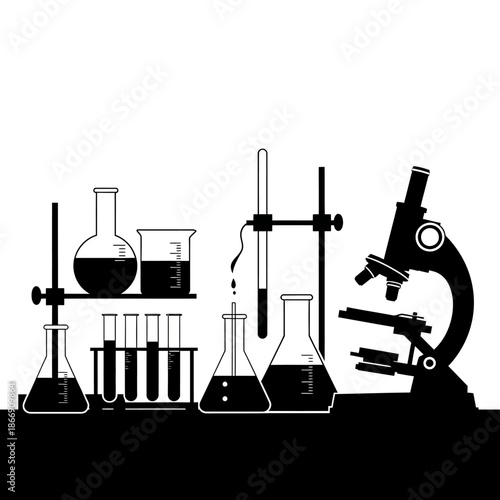 A collection of laboratory equipment including beakers flasks and a microscope