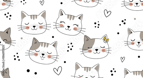 Seamless pattern showing various cute cartoon cat faces with hearts and dots on a white background for children and pet lovers.