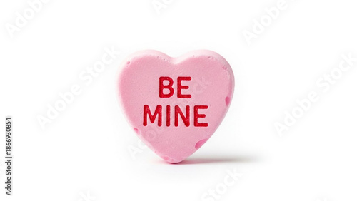 Pink heart-shaped candy with love text on white background, Valentine's Day sweet, romantic confection, conversation heart
