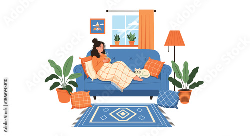 Cozy autumn home scene featuring a young woman resting on a comfortable blue sofa with a hot drink and her fluffy cat.