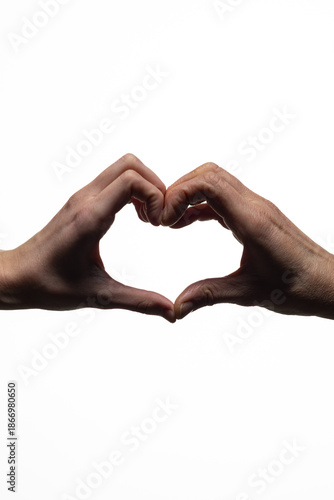 Wallpaper Mural Two hands from opposite sides join to create a heart shape, symbolizing love, unity, and compassion, set against a clean white background with copy space Torontodigital.ca