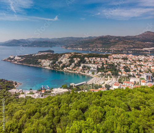 The beautiful Adriatic coast near Dubrovnik, Croatia. A city nestled in hills, forests, and cliffs.