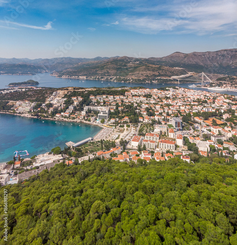 The beautiful Adriatic coast near Dubrovnik, Croatia. A city nestled in hills, forests, and cliffs.